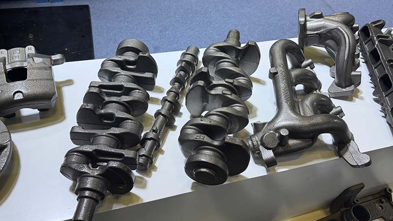 Detailed view of diverse automotive components after precision machining and advanced surface preparation.