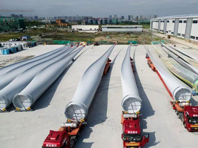 Surface Profile Uniformity in Wind Tower Section Blasting: Balancing Coating Adhesion Against Premature Fatigue Cracking 2 Automated wind tower section shot blasting process on heavy duty rollers