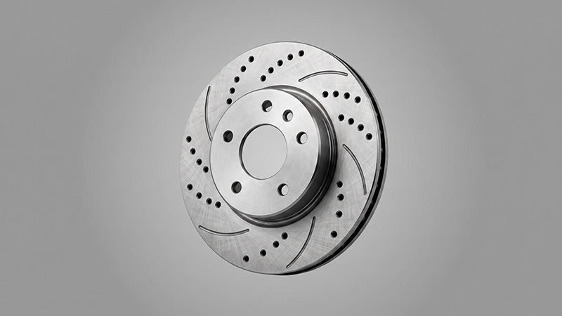 Cast iron automotive brake disc after high-speed automated shot blasting and descaling.
