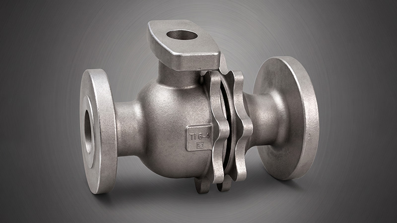 High-pressure casting valve steel body with massive bolt-hole flanges and distinct WCB CF8M material process inscriptions.