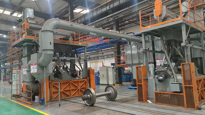 Exterior view of HQAMUR full-vehicle shot blasting machine housing for railway coaches and locomotives.